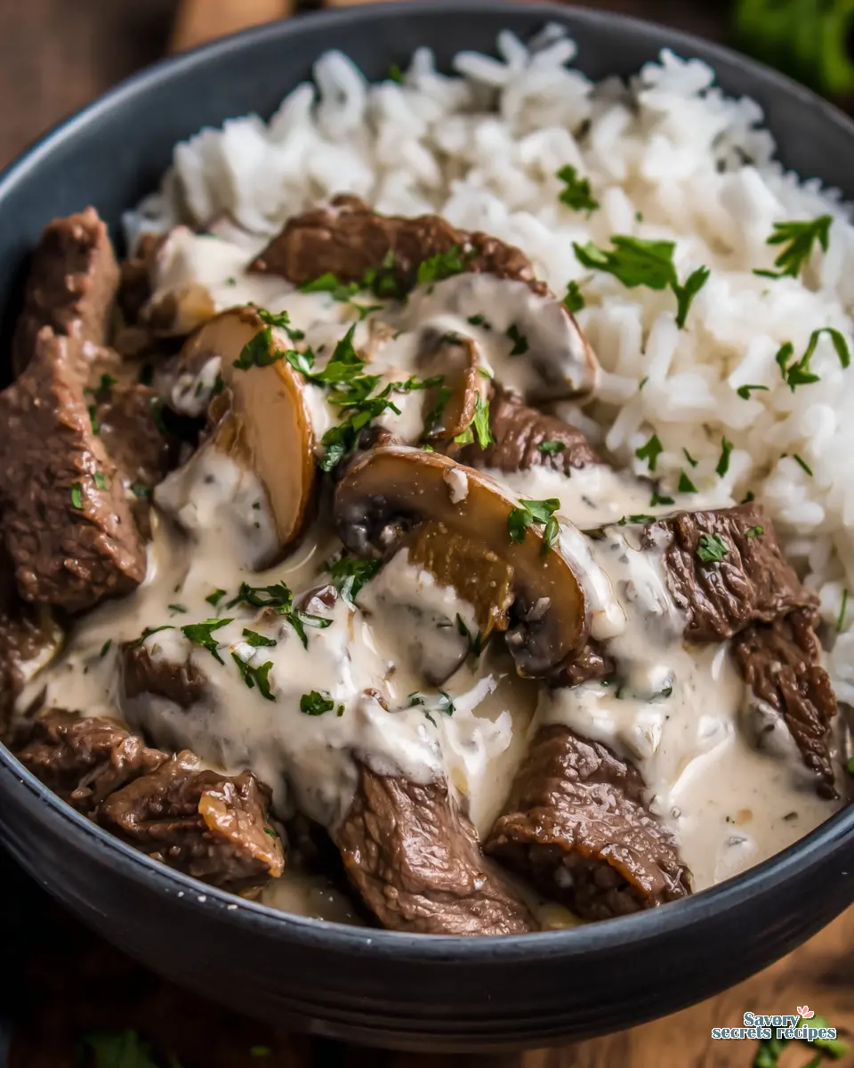 Searing beef strips in a hot skillet for Beef Stroganoff