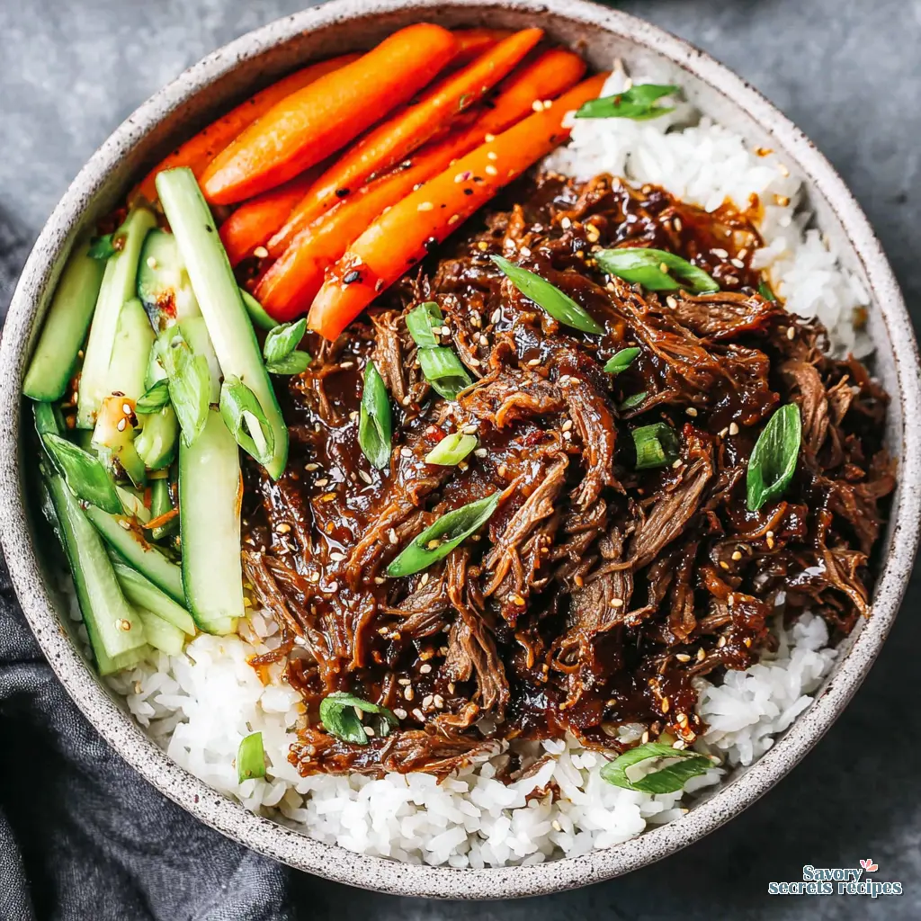close up of gluten free honey garlic beef sizzling in a pan